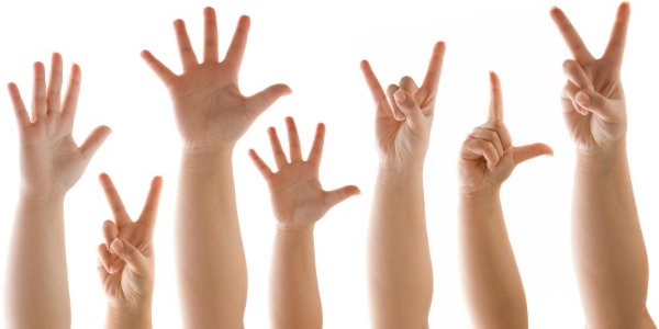 Kids Showing Various Sign Symbols Through Their Hand.